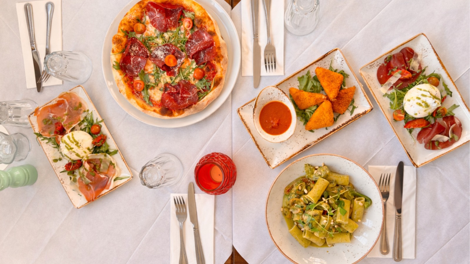 Italian sharing dishes laid out for a group